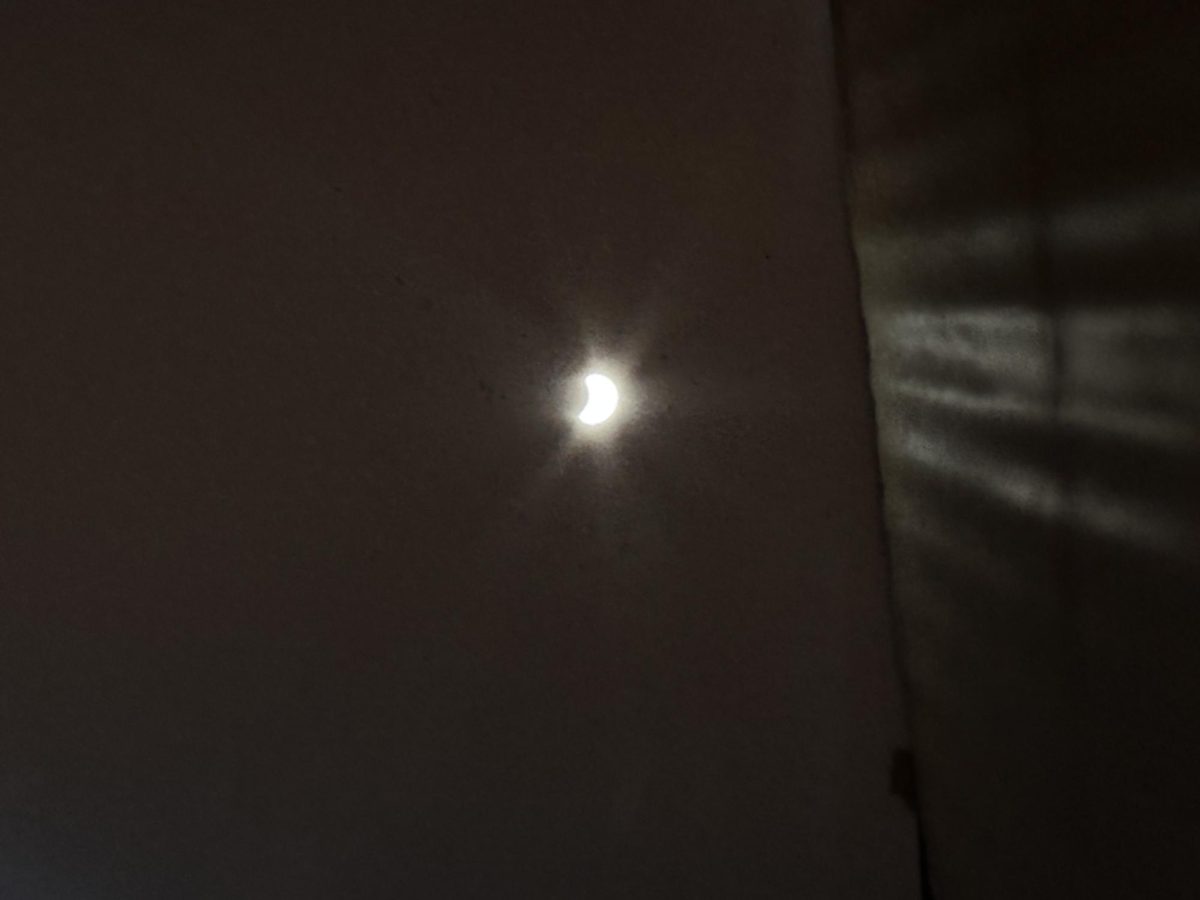 A partial solar eclipse as viewed through special lenses purchased on Amazon by Mr. Michel