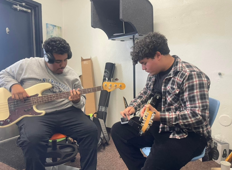 Levi and Nick jam in the studio