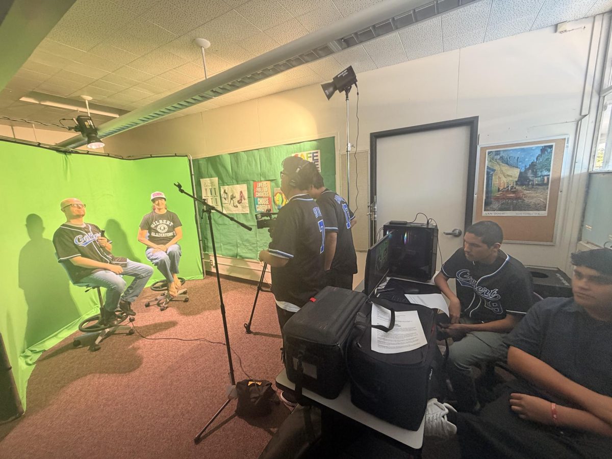 Mr. Dechene and Ms. Frese on camera as Video Production Club members are filming the March 2, 2026 Video Announcements.